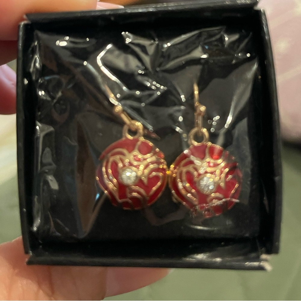 Red and gold earrings with diamonds